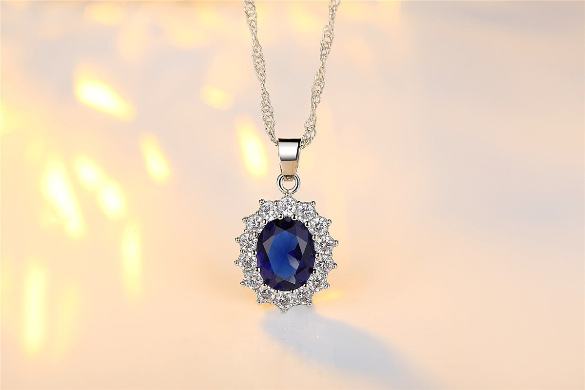 Elegant Blue Sapphire Oval Halo Jewelry Set – Necklace, Earrings & Ring