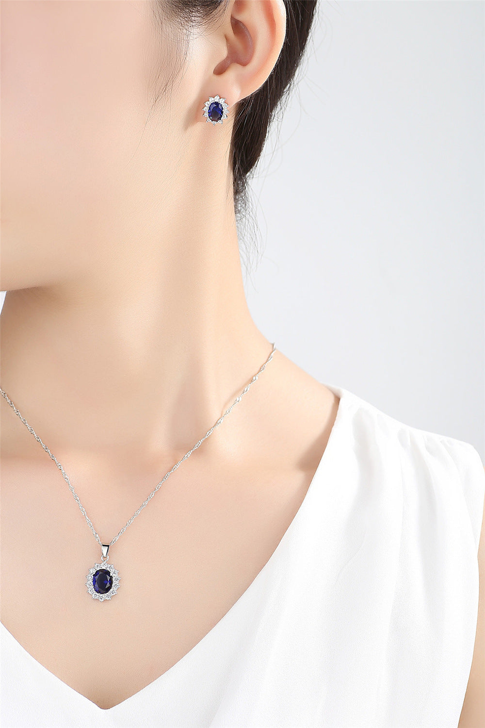 Elegant Blue Sapphire Oval Halo Jewelry Set – Necklace, Earrings & Ring