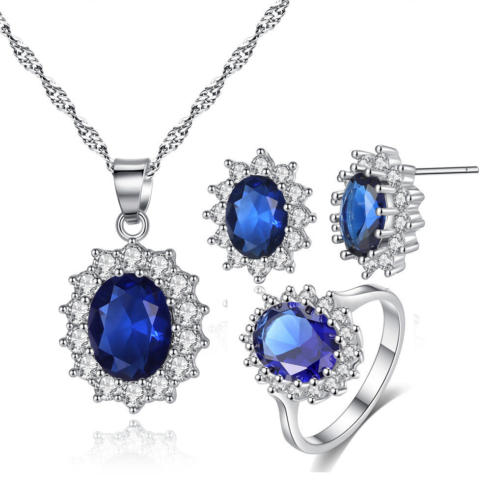 Elegant Blue Sapphire Oval Halo Jewelry Set – Necklace, Earrings & Ring