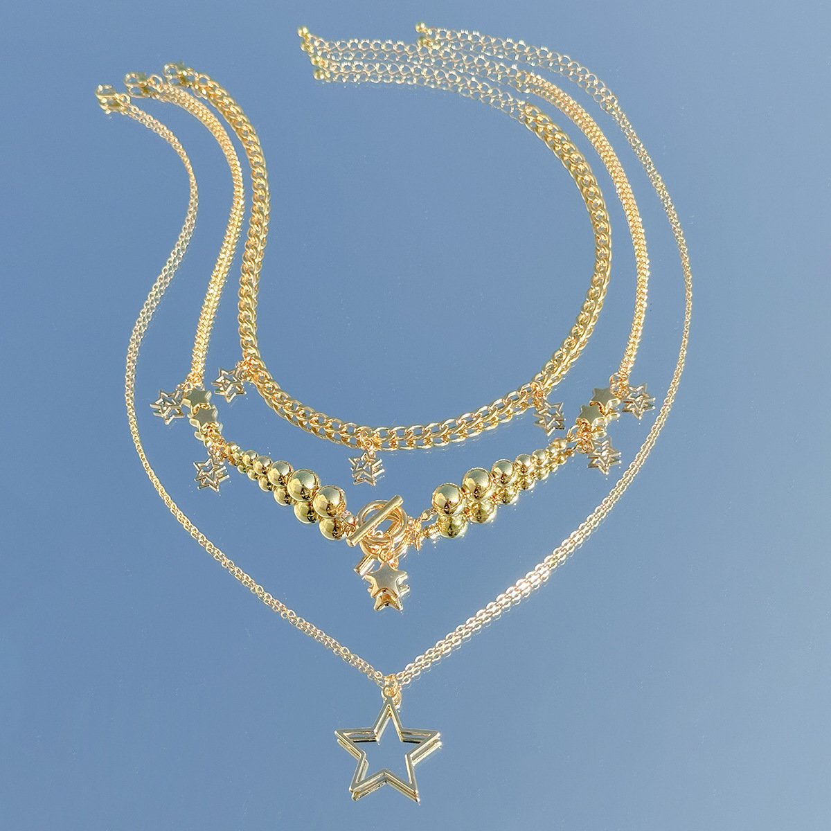 Trendy 3-Layer Gold-Plated Star Charm Necklace Set